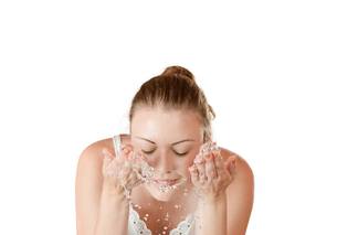 washes face